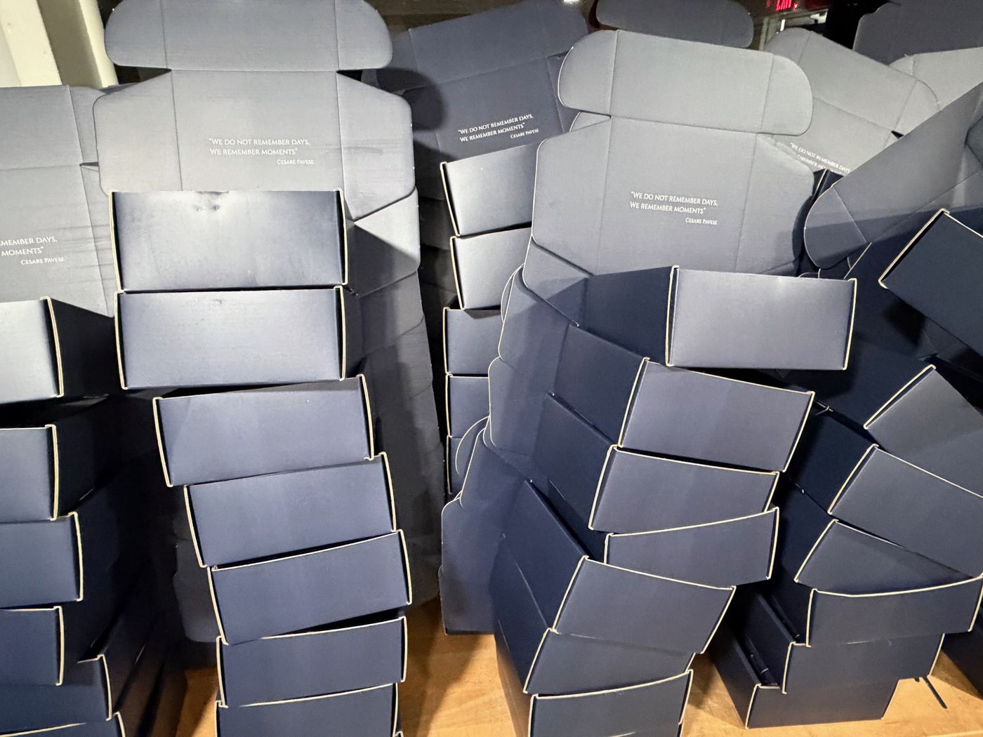 Branded mailer boxes staged for kitting and fulfillment