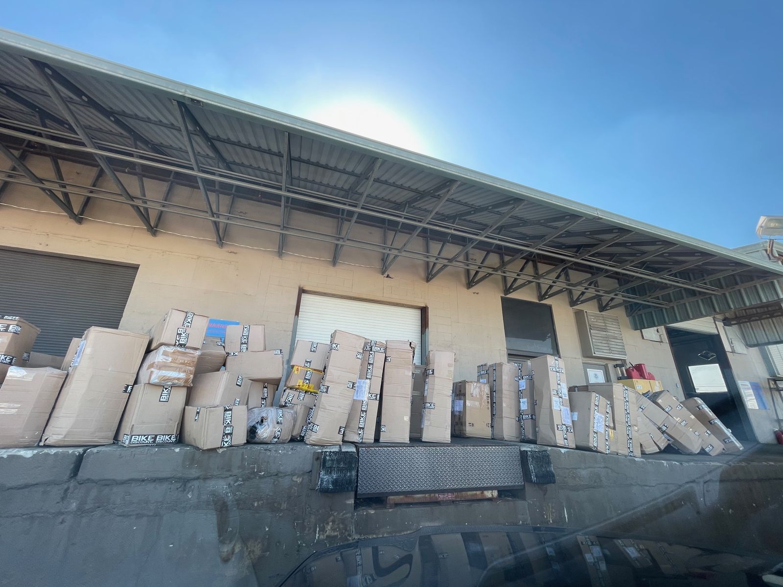 Inbound pallets and packages received and staged for FBA prep at FlexPrep
