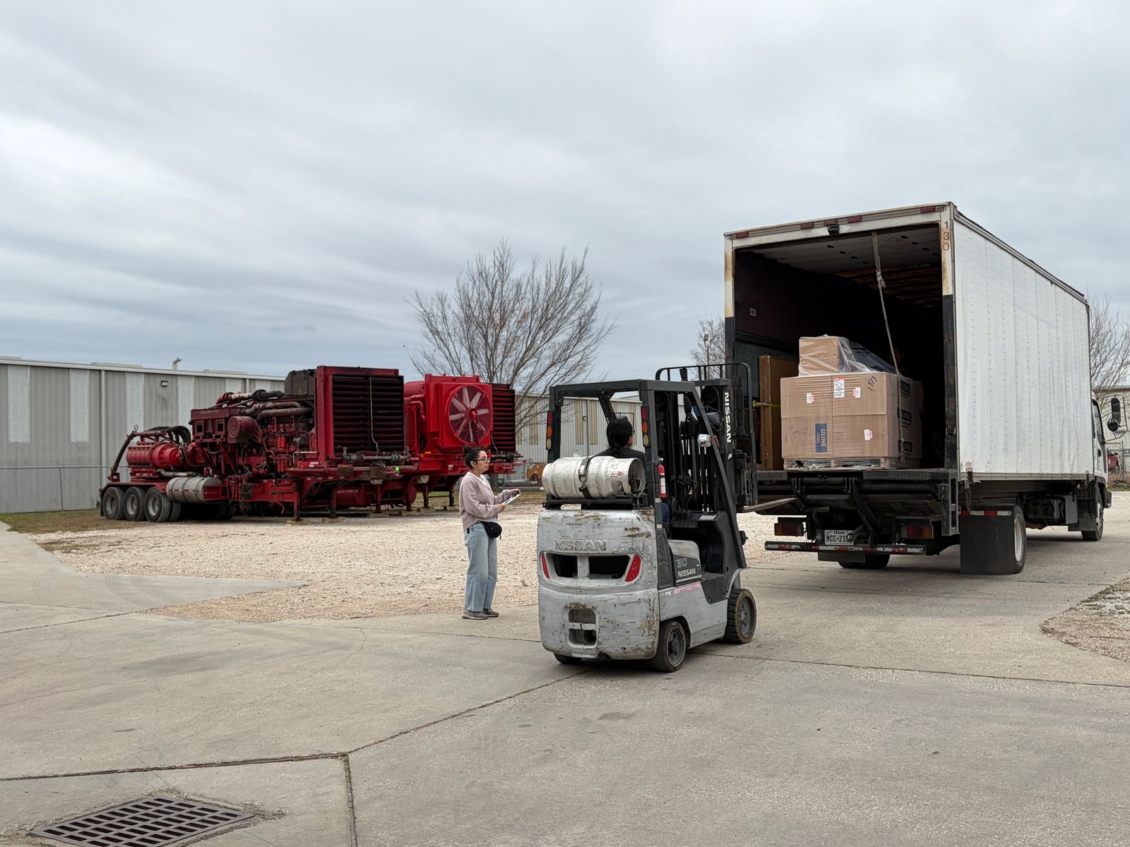 Forklift unloading inbound freight for fulfillment