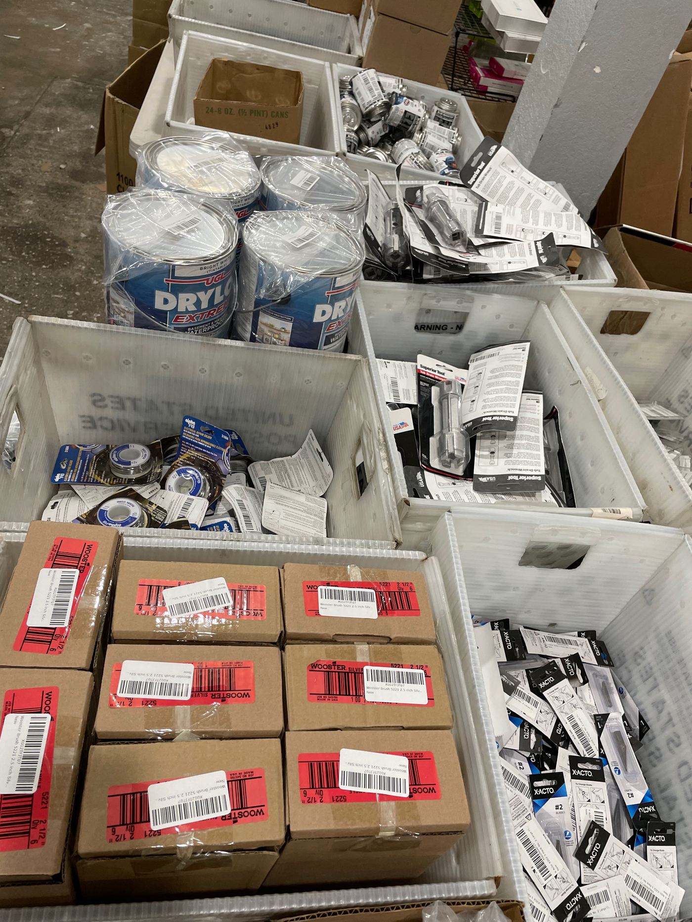FBA Removal Order inventory sorted into totes for inspection and grading