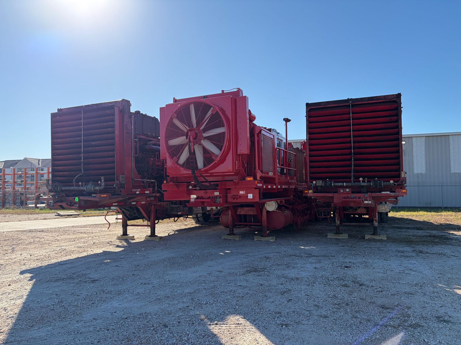 Industrial equipment staged on a trailer in FlexPrep's stabilized Houston yard